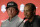 Phil Mickelson, left, listens to Tiger Woods speak during a news conference where they were announced as captain's picks for the 2018 U.S. Ryder Cup Team, Tuesday, Sept. 4, 2018, in West Conshohocken, Pa. (AP Photo/Matt Slocum)