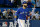 TORONTO, ON - OCTOBER 14:  Jose Bautista #19 of the Toronto Blue Jays watches after he he hits a three-run home run in the seventh inning against the Texas Rangers in game five of the American League Division Series at Rogers Centre on October 14, 2015 in Toronto, Canada.  (Photo by Tom Szczerbowski/Getty Images)