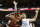 Texas' Kerwin Roach II, left, grabs a rebound over North Carolina's Luke Maye during the first half of an NCAA college basketball game Thursday, Nov. 22, 2018, in Las Vegas. (AP Photo/John Locher)