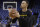 Golden State Warriors guard Stephen Curry warms up before an NBA basketball game between the Warriors and the Oklahoma City Thunder in Oakland, Calif., Wednesday, Nov. 21, 2018. (AP Photo/Jeff Chiu)