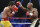 Floyd Mayweather Jr., right, throws a right against Manny Pacquiao, from the Philippines, during their welterweight title fight on Saturday, May 2, 2015 in Las Vegas. (AP Photo/John Locher)