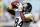 FILE- In this Nov. 18, 2018, file photo Pittsburgh Steelers wide receiver Antonio Brown catches a pass as he warms up before an NFL football game against the Jacksonville Jaguars in Jacksonville, Fla. When they take the field Sunday, Nov. 25, Broncos cornerback Chris Harris Jr. will have waited 1,072 days for his rematch with Brown. (AP Photo/Gary McCullough, File)
