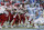 North Carolina State, left, and North Carolina players scuffle following the game-winning touchdown by North Carolina State's Reggie Gallaspy II (25) in overtime of an NCAA college football game in Chapel Hill, N.C., Saturday, Nov. 24, 2018. North Carolina State won 43-28. (AP Photo/Gerry Broome)