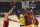 Los Angeles Lakers forward LeBron James, center, shoots as Indiana Pacers forward Bojan Bogdanovic, left, of Croatia, and center Myles Turner defend during the first half of an NBA basketball game Thursday, Nov. 29, 2018, in Los Angeles. (AP Photo/Mark J. Terrill)