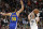 Utah Jazz forward Joe Ingles (2) shoots as Golden State Warriors guard Stephen Curry (30) defends in the second half during an NBA basketball game Friday, Oct. 19, 2018, in Salt Lake City. (AP Photo/Rick Bowmer)