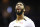 New Orleans Pelicans center Anthony Davis looks at the scoreboard while facing the Charlotte Hornets in the second half of an NBA basketball game Sunday, Dec. 2, 2018, in Charlotte, N.C. New Orleans won 119 to 109. (AP Photo/Jason E. Miczek)