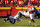 Kansas City Chiefs quarterback Patrick Mahomes (15) evades Baltimore Ravens linebacker Terrell Suggs (55) during the first half of an NFL football game in Kansas City, Mo., Sunday, Dec. 9, 2018. (AP Photo/Charlie Riedel)