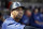 Chicago White Sox first base coach Harold Baines looks out from the dugout during the seventh inning of a baseball game against the Detroit Tigers in Detroit, Saturday, July 16, 2011. (AP Photo/Carlos Osorio)