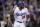 Los Angeles Dodgers' Yasiel Puig flips his bat as he watches his solo home run during the sixth inning of the team's baseball game against the Colorado Rockies on Tuesday, May 22, 2018, in Los Angeles. (AP Photo/Mark J. Terrill)