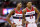 WASHINGTON, DC - NOVEMBER 26: Bradley Beal #3 and Otto Porter Jr. #22 of the Washington Wizards look on as the San Antonio Spurs shoot a technical foul shot in the second half at Verizon Center on November 26, 2016 in Washington, DC. NOTE TO USER: User expressly acknowledges and agrees that, by downloading and or using this photograph, User is consenting to the terms and conditions of the Getty Images License Agreement.  (Photo by Rob Carr/Getty Images)