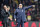 Chelsea's team manager Maurizio Sarri, center, gives instructions during the English Premier League soccer match between Watford and Chelsea at Vicarage Road stadium in Watford, England on Wednesday, Dec. 26, 2018. (AP Photo/Frank Augstein)