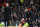 Manchester United's manager Sir Alex Ferguson, left, and Southampton's  manager Mauricio Pochettino stand on the touchline during their English Premier League soccer match at Old Trafford Stadium, Manchester, England, Wednesday Jan. 30, 2013. (AP Photo/Jon Super)