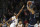 Minnesota Timberwolves' Derrick Rose shoots the game-winning shot over Phoenix Suns' Mikal Bridges in the first half of an NBA basketball game Sunday, Jan. 20, 2019, in Minneapolis. Minnesota won 116-114. (AP Photo/Stacy Bengs)