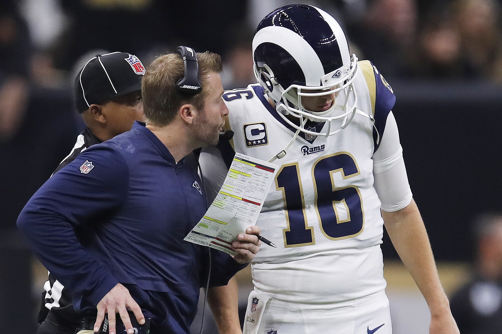 Los Angeles Rams head coach Sean McVay speaks with Jared Goff during the first half of the NFL football NFC championship game against the New Orleans Saints, Sunday, Jan. 20, 2019, in New Orleans. (AP Photo/Carolyn Kaster)
