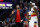 New Orleans Pelicans forward Anthony Davis talks to guard Jrue Holiday, foreground, in the second half of an NBA basketball game in New Orleans, Wednesday, Jan. 23, 2019. The Pistons won 98-94. (AP Photo/Gerald Herbert)