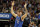 Dallas Mavericks forward Luka Doncic of Germany raises his arms during the second half of an NBA basketball game in Dallas, Tuesday, Jan. 22, 2019. (AP Photo/LM Otero)