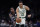 Boston Celtics forward Jayson Tatum (0) outruns Brooklyn Nets forward Rondae Hollis-Jefferson (24) during the second half of an NBA basketball game in Boston, Monday, Jan. 28, 2019. The Celtics won 112-104. (AP Photo/Charles Krupa)