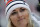 United States' Lindsey Vonn stands in the mixed zone after the women's combined at the 2018 Winter Olympics in Jeongseon, South Korea, Thursday, Feb. 22, 2018. (AP Photo/Michael Probst)