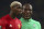 Manchester United's Paul Pogba, left, and St.-Etienne's Florentin Pogba during the Europa League round of 32 first leg soccer match between Manchester United and St.-Etienne at the Old Trafford stadium in Manchester, England, Thursday, Feb. 16, 2017 . (AP Photo/Dave Thompson)