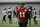 Philadelphia Eagles quarterback Carson Wentz walks onto the field during practice at the team's NFL football training facility in Philadelphia, Friday, Jan. 11, 2019. The Eagles will play the New Orleans Saints in a divisional playoff game on Sunday in New Orleans.(AP Photo/Matt Rourke)