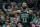 Boston Celtics' Kyrie Irving reacts after making a three-pointer during the first half of an NBA basketball game against the Oklahoma City Thunder in Boston, Sunday, Feb. 3, 2019. (AP Photo/Michael Dwyer)