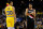 OAKLAND, CA - DECEMBER 27: Brothers Stephen Curry #30 of the Golden State Warriors and Seth Curry #31 of the Portland Trail Blazers share a laugh on court during their game at ORACLE Arena on December 27, 2018 in Oakland, California. NOTE TO USER: User expressly acknowledges and agrees that, by downloading and or using this photograph, User is consenting to the terms and conditions of the Getty Images License Agreement. (Photo by Lachlan Cunningham/Getty Images)