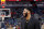 New Orleans Pelicans forward Anthony Davis laughs as he walks on the court before an NBA basketball game against the Indiana Pacers in New Orleans, Monday, Feb. 4, 2019. (AP Photo/Gerald Herbert)