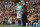 Manchester City's Portuguese midfielder Bernardo Silva receives instruction from Manchester City's Spanish manager Pep Guardiola before coming on during the English Premier League football match between Manchester City and Newcastle United at the Etihad Stadium in Manchester, north west England, on September 1, 2018. (Photo by Oli SCARFF / AFP) / RESTRICTED TO EDITORIAL USE. No use with unauthorized audio, video, data, fixture lists, club/league logos or 'live' services. Online in-match use limited to 120 images. An additional 40 images may be used in extra time. No video emulation. Social media in-match use limited to 120 images. An additional 40 images may be used in extra time. No use in betting publications, games or single club/league/player publications. /         (Photo credit should read OLI SCARFF/AFP/Getty Images)