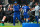 NEWCASTLE UPON TYNE, ENGLAND - AUGUST 26:  Pedro of Chelsea shakes hands with Chelsea manager Maurizio Sarri and Assistant manager of Chelsea Gianfranco Zola after being substituted during the Premier League match between Newcastle United and Chelsea FC at St. James Park on August 26, 2018 in Newcastle upon Tyne, United Kingdom.  (Photo by Chris Brunskill/Fantasista/Getty Images)