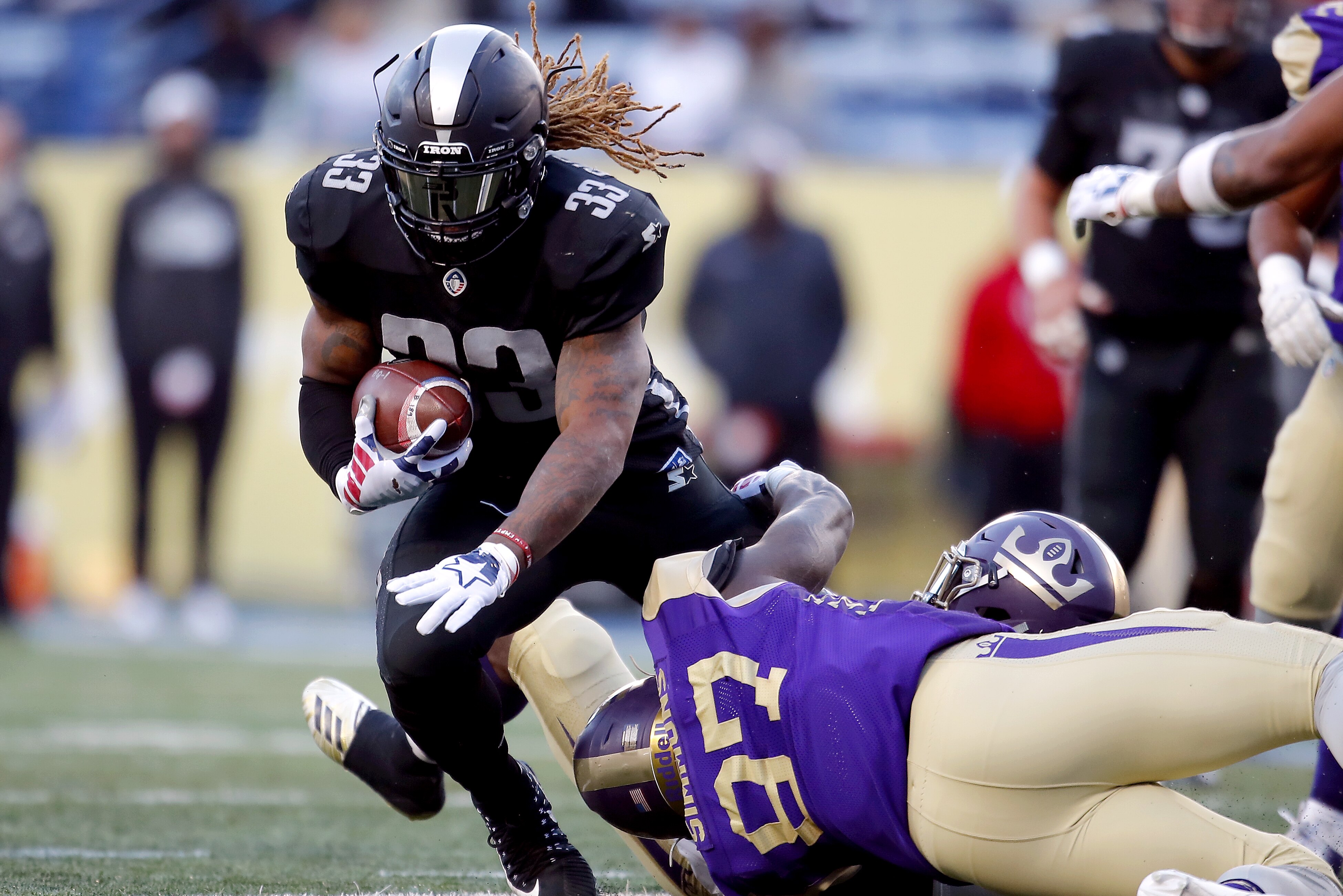 ATLANTA, GEORGIA - FEBRUARY 24: Trent Richardson #33 of Birmingham Iron runs the ball against the Atlanta Legends during the Alliance of American Football game at Georgia State Stadium on February 24, 2019 in Atlanta, Georgia. (Photo by Todd Kirkland/AAF/Getty Images)