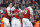 Arsenal's French striker Alexandre Lacazette celebrates with teammates after scoring during the English Premier League football match between Arsenal and Southampton at the Emirates Stadium in London on February 24, 2019. (Photo by Ian KINGTON / AFP) / RESTRICTED TO EDITORIAL USE. No use with unauthorized audio, video, data, fixture lists, club/league logos or 'live' services. Online in-match use limited to 120 images. An additional 40 images may be used in extra time. No video emulation. Social media in-match use limited to 120 images. An additional 40 images may be used in extra time. No use in betting publications, games or single club/league/player publications. /         (Photo credit should read IAN KINGTON/AFP/Getty Images)