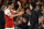 Arsenal's German midfielder Mesut Ozil (L) shakes hands with Arsenal's Spanish head coach Unai Emery (R) after being substituted during the English Premier League football match between Arsenal and Leicester City at the Emirates Stadium in London on October 22, 2018. (Photo by Glyn KIRK / IKIMAGES / AFP) / RESTRICTED TO EDITORIAL USE. No use with unauthorized audio, video, data, fixture lists, club/league logos or 'live' services. Online in-match use limited to 45 images, no video emulation. No use in betting, games or single club/league/player publications.        (Photo credit should read GLYN KIRK/AFP/Getty Images)
