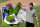 Bryce Harper stands with the Philadelphia Phillies mascot Phanatic before being introduced as a Phillies player during a news conference at the team's spring training baseball facility, Saturday, March 2, 2019, in Clearwater, Fla. Harper and the Phillies agreed to a $330 million, 13-year contract, the largest deal in baseball history. (AP Photo/Lynne Sladky)