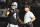 OAKLAND, CA - SEPTEMBER 10:  Derek Carr #4 of the Oakland Raiders speaks with head coach Jon Gruden in the first quarter during their NFL game against the Los Angeles Rams at Oakland-Alameda County Coliseum on September 10, 2018 in Oakland, California.  (Photo by Thearon W. Henderson/Getty Images)