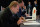 NEW YORK, NEW YORK - MAY 16: Robert Sarver of the Phoenix Suns takes notes inside the lottery room during the 2017 NBA Draft Lottery at the New York Hilton in New York, New York. NOTE TO USER: User expressly acknowledges and agrees that, by downloading and or using this Photograph, user is consenting to the terms and conditions of the Getty Images License Agreement. Mandatory Copyright Notice: Copyright 2017 NBAE (Photo by Jennifer Pottheiser/NBAE via Getty Images)