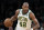 Boston Celtics center Al Horford (42) handles the ball in the first quarter of an NBA basketball game, Friday, March 1, 2019, in Boston. (AP Photo/Elise Amendola)