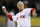 FILE - In this Oct. 23, 2013 file photo, former Boston Red Sox Carl Yastrzemski throws out a ceremonial first pitch before Game 1 of baseball's World Series against the St. Louis Cardinals in Boston. Kobe Bryant has announced that this season on Sunday, Nov. 29, 2015, will be his last. Bryant is the first NBA player to spend that many years with one franchise, though it’s not completely uncommon across the other pro sports in the United States. Yaz had 1,822 hits for the Red Sox at Fenway Park. That's 11 more than Wade Boggs and Nomar Garciaparra, combined. (AP Photo/Charles Krupa, File)