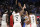 Toronto Raptors' Danny Green, second from right, celebrates his game winning shot against the Orlando Magic with teammates, including Pascal Siakam (43) Kawhi Leonard (2) and Kyle Lowry (7) after an NBA basketball game, Tuesday, Nov. 20, 2018, in Orlando, Fla. (AP Photo/John Raoux)