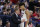 Gonzaga head coach Mark Few, left, speaks with forward Jeremy Jones during the second half of an NCAA college basketball game against BYU in Spokane, Wash., Saturday, Feb. 23, 2019. (AP Photo/Young Kwak)