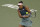 Naomi Osaka, of Japan, returns a shot to Danielle Collins at the BNP Paribas Open tennis tournament Monday, March 11, 2019, in Indian Wells, Calif. (AP Photo/Mark J. Terrill)