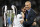 FILE - In this Saturday, May 26, 2018 file photo Real Madrid's Isco hugs coach Zinedine Zidane, right, after winning the Champions League Final soccer match between Real Madrid and Liverpool at the Olimpiyskiy Stadium in Kiev, Ukraine. Zidane says he is quitting Real Madrid after two and a half seasons with the Spanish club. The surprise announcement comes less than a week after Zidane led Madrid to its third straight Champions League title.(AP Photo/Pavel Golovkin, File)
