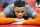 Oklahoma City Thunder guard Russell Westbrook looks on as he is stretched before the start of their NBA basketball game against the Utah Jazz Monday, March 11, 2019, in Salt Lake City. (AP Photo/Rick Bowmer)
