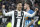 TURIN, ITALY - MARCH 12: Cristiano Ronaldo of Juventus celebrates the victory at final whistle while Saul Niguez of Atletico Madrid is dejected following the UEFA Champions League Round of 16 Second Leg match between Juventus and Club de Atletico Madrid at Allianz Stadium on March 12, 2019 in Turin, Italy. (Photo by Jean Catuffe/Getty Images)