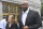 FILE - In this Oct. 10, 2017, file photo, Chuck Person leaves Manhattan federal court in New York. Auburn has fired associate head basketball coach Chuck Person, who has been indicted on federal bribery, conspiracy and fraud charges. The university announced the move Wednesday, Nov. 8, 2017, a day after Person and seven others were indicted by a federal grand jury in New York City. (AP Photo/Larry Neumeister, File)