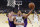 Milwaukee Bucks guard Malcolm Brogdon shoots as Los Angeles Lakers forward Mike Muscala, left, defends during the first half of an NBA basketball game Friday, March 1, 2019, in Los Angeles. (AP Photo/Mark J. Terrill)