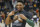 Utah Jazz guard Donovan Mitchell wears a solidarity T-shirt, during warm-ups before the start of their NBA basketball game against the Brooklyn Nets Saturday, March 16, 2019, in Salt Lake City. (AP Photo/Rick Bowmer)