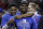 Duke's RJ Barrett, left, hugs Zion Williamson after Duke defeated Florida State in the NCAA college basketball championship game of the Atlantic Coast Conference tournament in Charlotte, N.C., Saturday, March 16, 2019. (AP Photo/Chuck Burton)