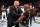 LAS VEGAS, NV - JULY 07:  Brock Lesnar confronts Daniel Cormier after his UFC heavyweight championship fight during the UFC 226 event inside T-Mobile Arena on July 7, 2018 in Las Vegas, Nevada.  (Photo by Josh Hedges/Zuffa LLC/Zuffa LLC via Getty Images)