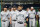 Seattle Mariners right fielder Ichiro Suzuki leaves after his team's group photo prior to Game 1 of a Major League opening series baseball game against the Oakland Athletics at Tokyo Dome in Tokyo, Wednesday, March 20, 2019. (AP Photo/Toru Takahashi)