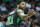 Boston Celtics guard Kyrie Irving reacts after a referee call while facing the Charlotte Hornets in the first half of an NBA basketball game Saturday, March 23, 2019, in Charlotte, N.C. (AP Photo/Jason E. Miczek)
